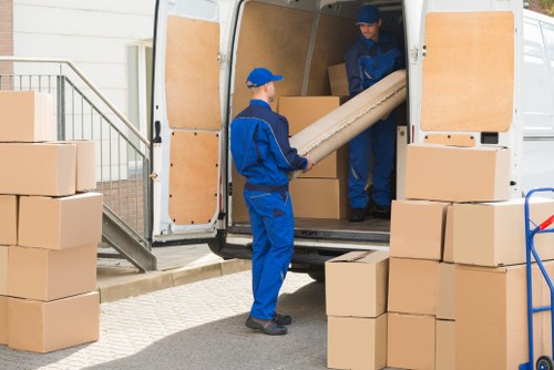 Furniture removal team handling a move in Kennington