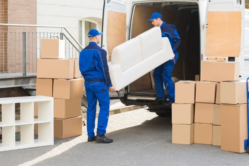Loading furniture into a moving truck in Kennington