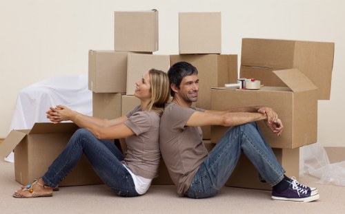 Stacked moving boxes and wardrobe cartons suitable for Kennington homes and businesses