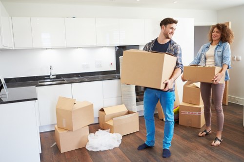 Loading household furniture into a van near Kennington