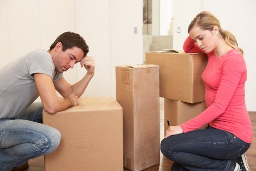 Packed office boxes and furniture prepared for relocation