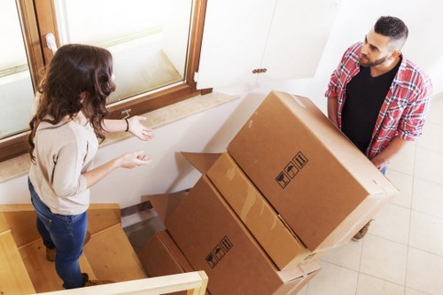 Professional movers handling furniture during a Kennington house removal