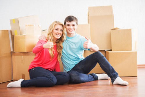 Piano movers planning a careful removal in Kennington