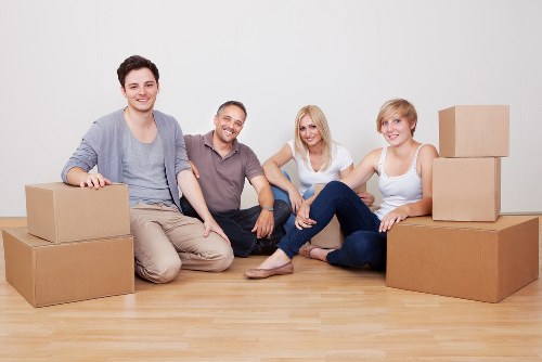 Office relocation logistics with labelled boxes and desks